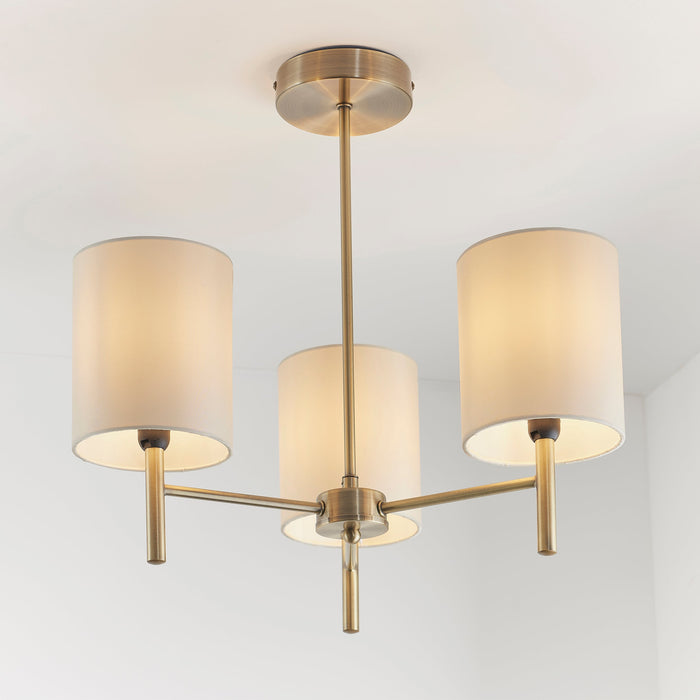 Endon BRIO-3AB Brio 3lt Semi flush Antique brass plate & cream fabric 3 x 40W E14 golf (Required) - westbasedirect.com