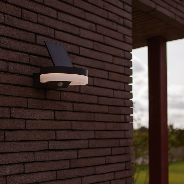 Lutec 6915801335 RUNDA 12W IP54 LED Solar Outdoor Wall Light with PIR 4000K - Dark Grey
