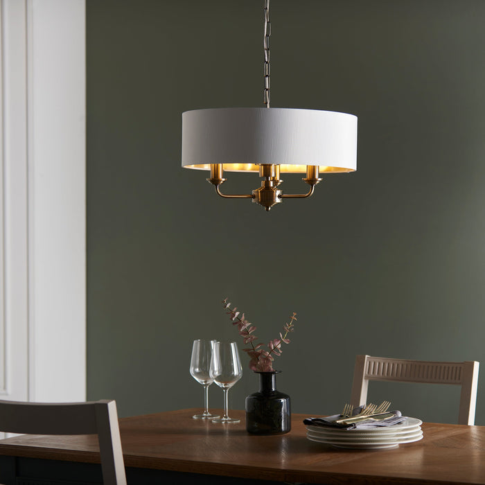 Endon 98934 Highclere 3lt Pendant Antique brass plate & vintage white fabric 3 x 40W E14 candle (Required) - westbasedirect.com