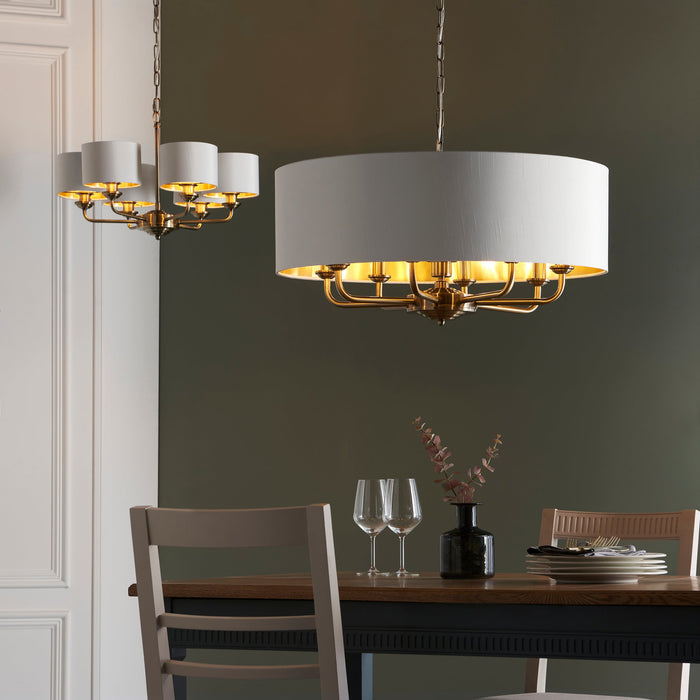 Endon 98938 Highclere 8lt Pendant Antique brass plate & vintage white fabric 8 x 40W E14 candle (Required) - westbasedirect.com